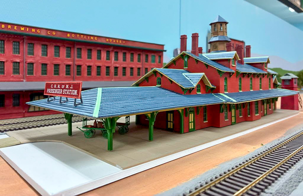 Many of the buildings are scratchbuilt to reflect specific structures, like this in-progress model of the Central Railroad of New Jersey depot in Wilkes-Barre, PA. 